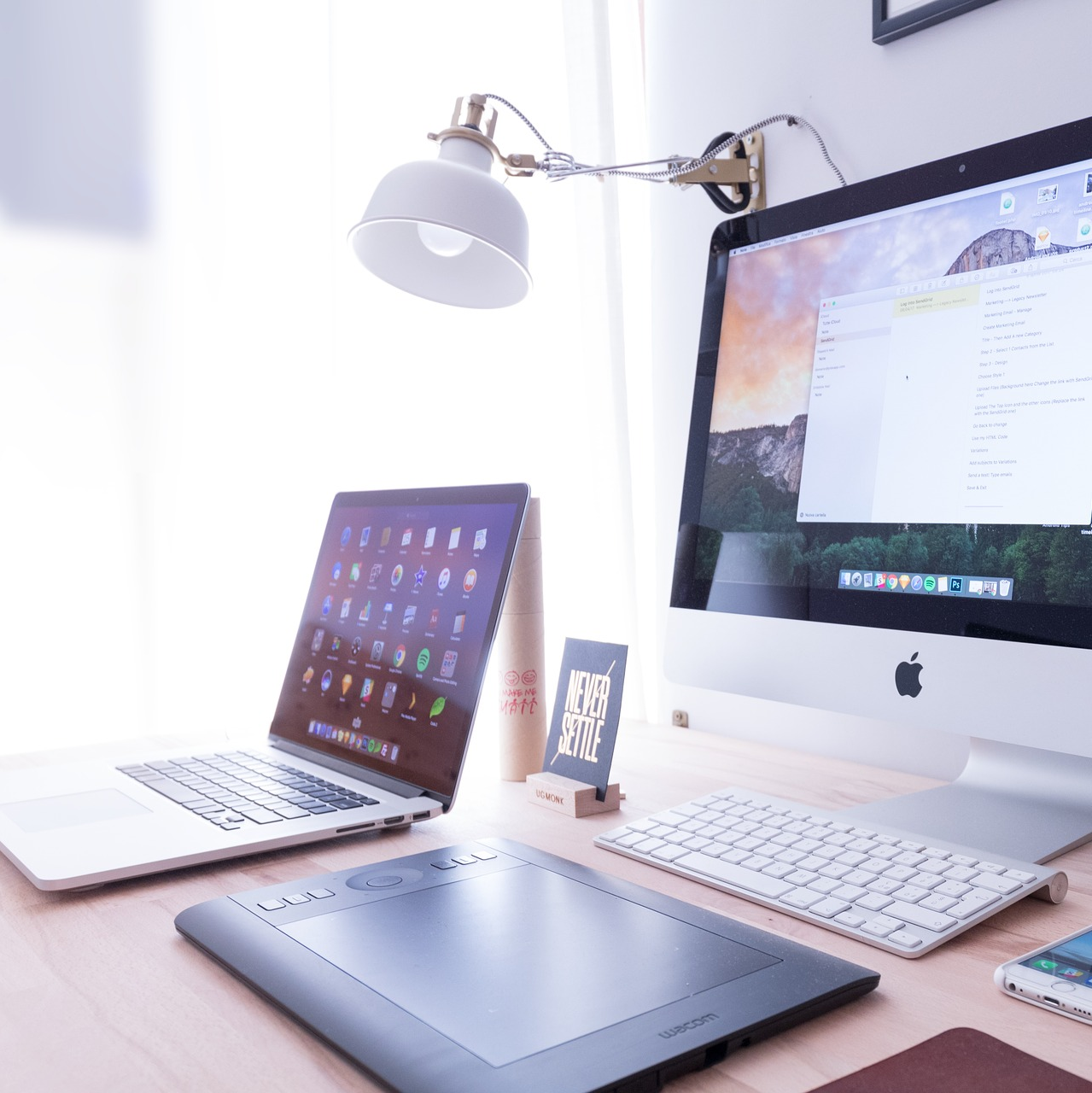 Apple Mac, Apple laptop and mouse on computer table